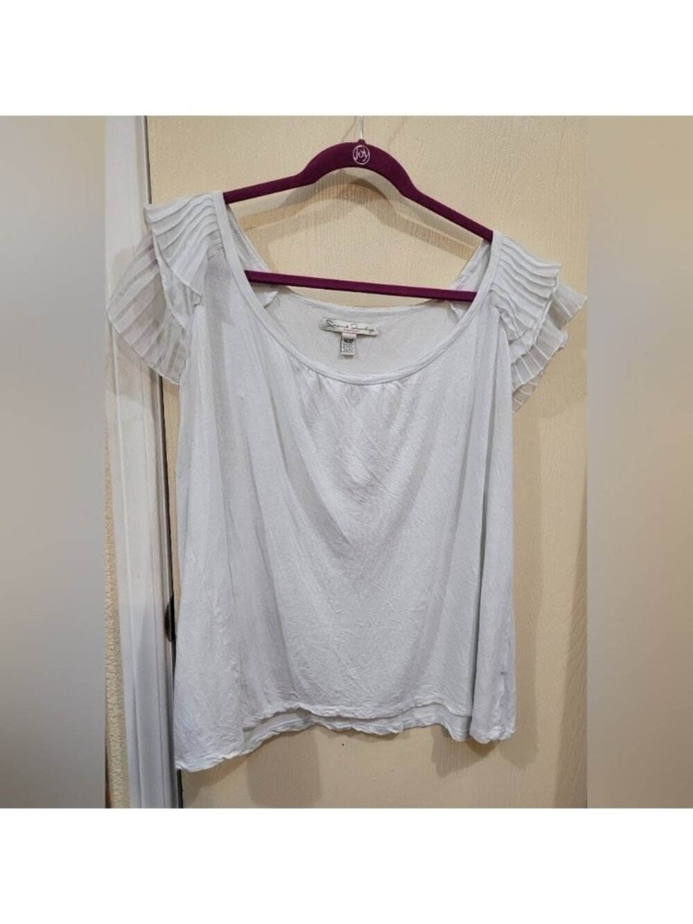 White flutter sleeve top